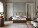 Letto Prestige con testiera imbottita rivestita in ecopelle di Tomasella