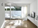 Tavolo rotondo in vetro verniciato bianco con base in acciaio Around di Unico Italia