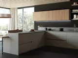 Cucina Design angolare in laminato HPL e in bilaminato legno in finitura Noce Menta 06 di Miton
